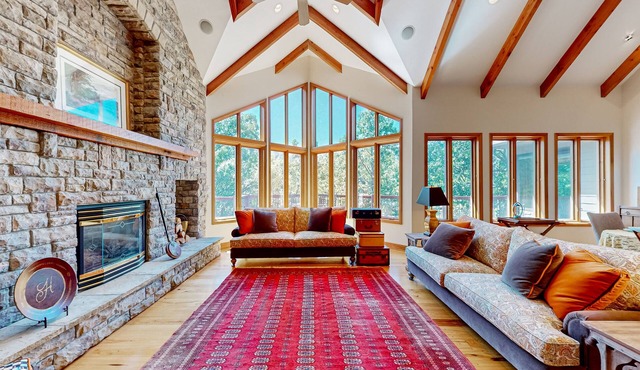Elegant lake house with gourmet kitchen, game room, scenic views & lake frontage