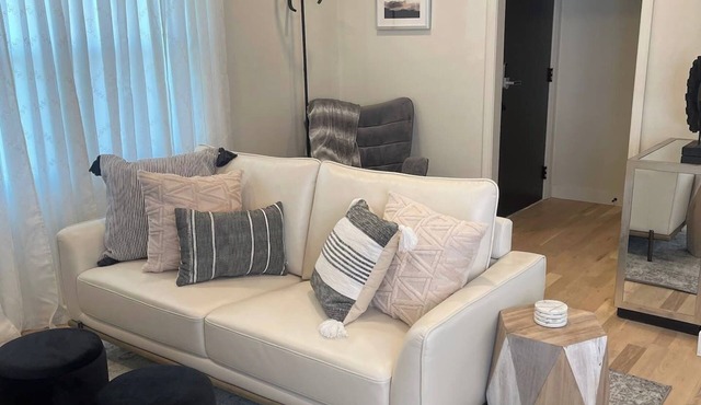 Elegant Modern 2BR Escape with Secure Garage Parking