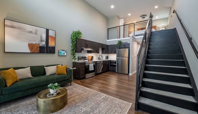 Elevate Your Stay in Our Stunning Loft with 17-Foot Ceilings