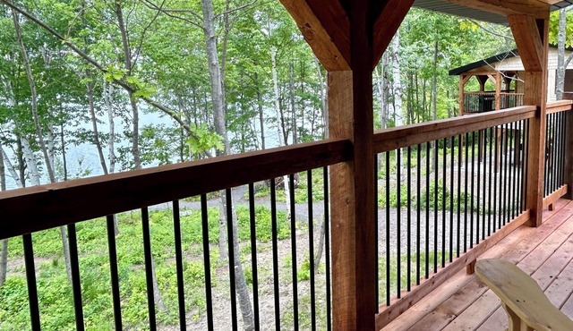 Elevated cabin nestled among the trees, and the Saint John River. Pet friendly.n