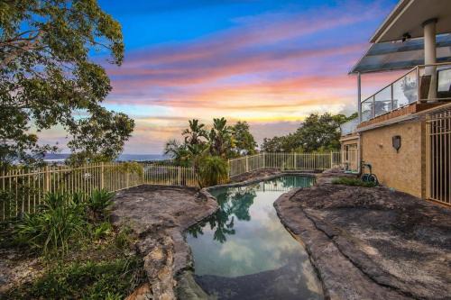 Elevated Coastal Retreat With Pool And Views