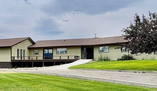 Elevated Elegance with Golf Course Access & Panoramic Valley Views