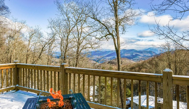 Elevated mountain-view cabin with private hot tub, 2 decks, firepit, & grill