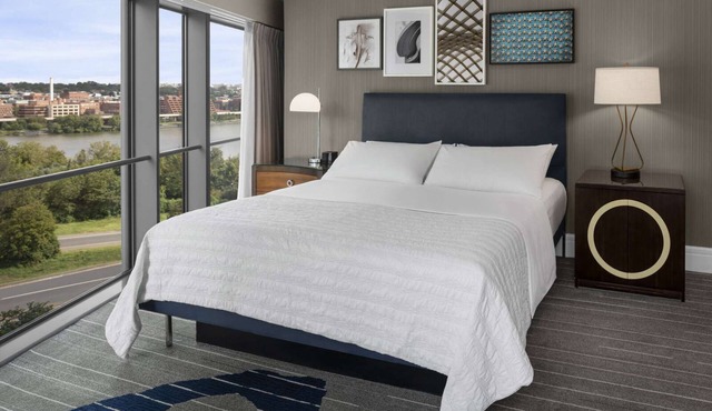 Elevated Stay | Riverfront Dining. Fitness Gym.