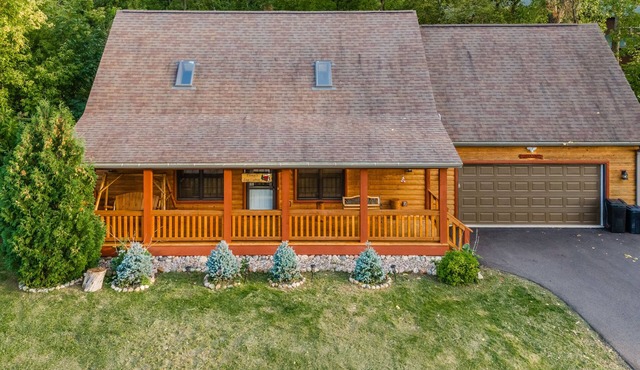 Elina’s Log Cabin, new on the market, steps from Devil’s Lake State Park.