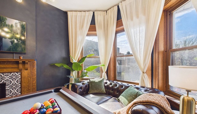 Elite 4BR Art Deco suite. Garage included.