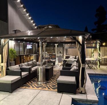 Elk Grove Finest with gorgeous backyard, pool and bar area with a game room