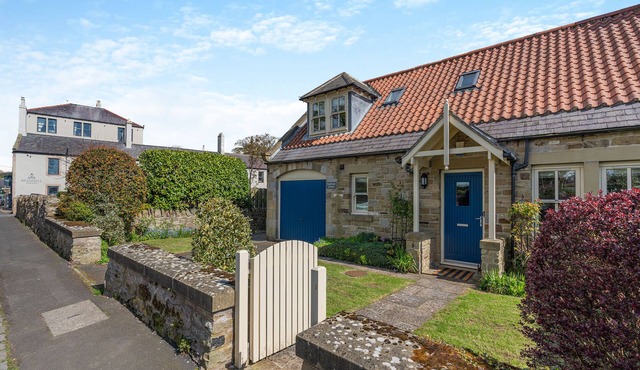 Embrace Coastal Comforts by the Fire: Your Perfect Retreat Awaits in Beadnell.