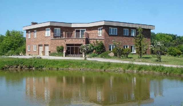 Embrace Spring in style on 25 acre of land with indoor heated swimming pool!