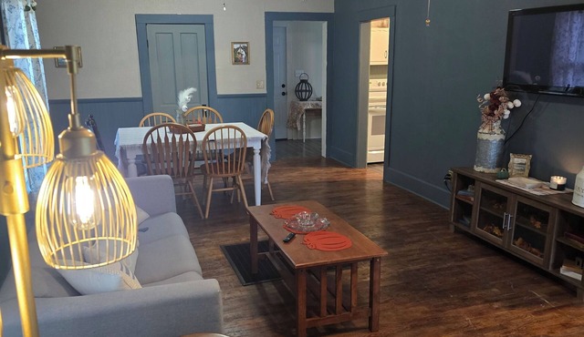 Enchanted Cottage, located in Herington, KS with 1.5 bedrooms and a shaded yard