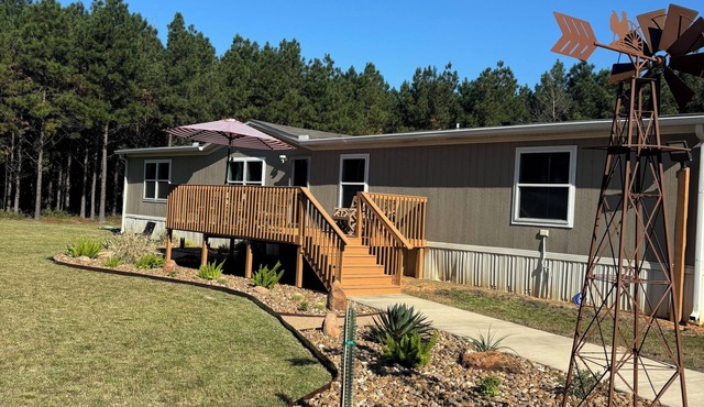 Enchanting and relaxing 4-bedroom pine house with plenty outdoor space to enjoy.