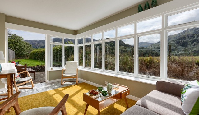 Enchanting, rustic cottage w/superb views and private river.