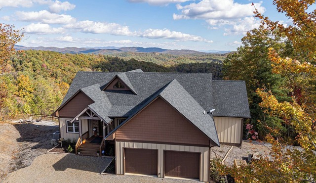 Endless views, hot tub, game room and theater!