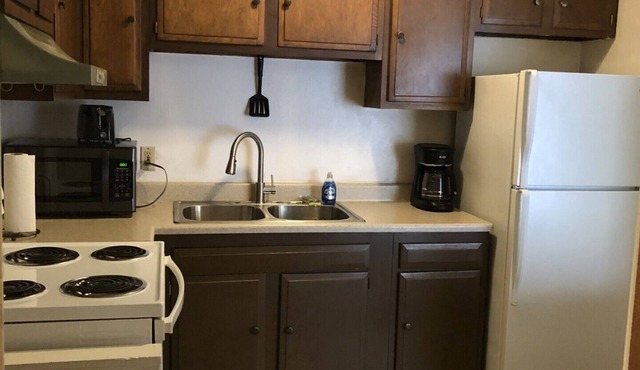 English Tudor Apartment with Assigned Covered Parking