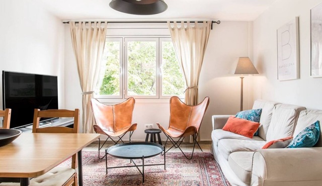 Enjoy a peaceful escape from the hustle and bustle of the city center in this thoughtfully designed apartment.