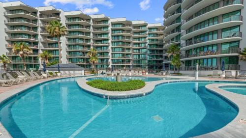 Enjoy a 3-bedroom Bayfront Condo with Lazy River Indoor Pool Jacuzzis and Community Boat Dock for Personal or Rented Boats Plus Redeem in Free Activity Deals Daily