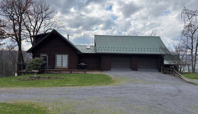 Enjoy a beautiful log cabin overlooking Belleville, PA with stunning views