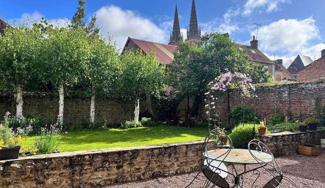 Enjoy a cozy setting with a stunning view of the majestic Sées Cathedral.