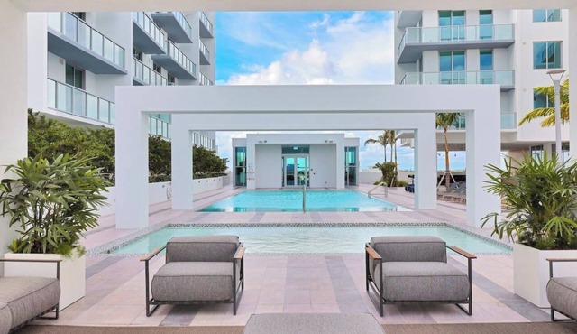 Enjoy a panoramic view of the pool and Miami’s stunning sunsets This.