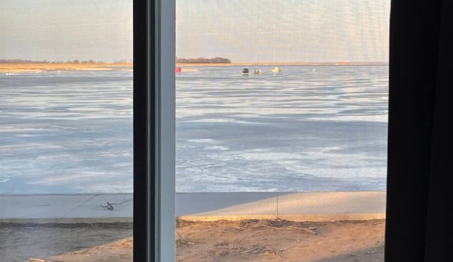 Enjoy a panoramic view from a private home on the water