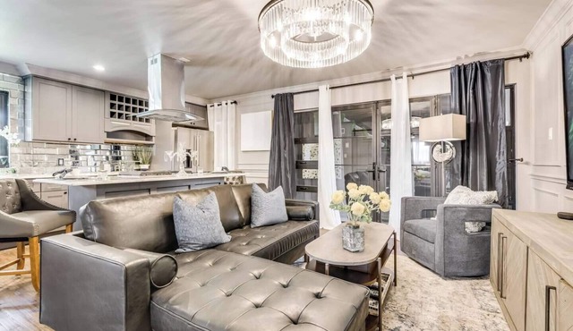 Enjoy a sophisticated stay in this modern 1-bedroom suite with high-end amenities and access to a shared on-site jacuzzi—ideal for work trips or weekend getaways