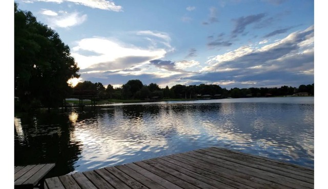 Enjoy a step back in time on an Authentic "Old Florida" Lakefront property.