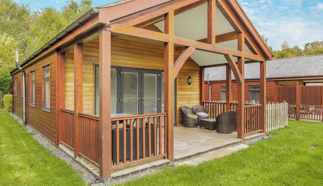 Enjoy a summer BBQ in the lawned garden.