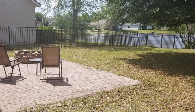 Enjoy a vast backyard with lake access,