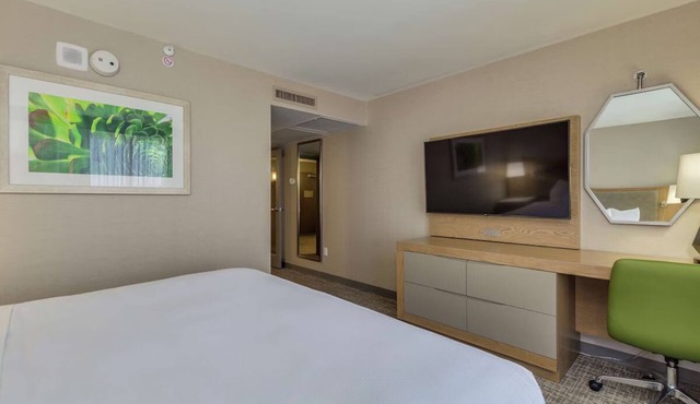 Enjoy an Eco-Certified Stay with Heated Pool, On-Site Dining, and I‑10 Access