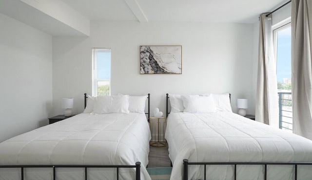 Enjoy City Skyline Views from private RoofDeck!