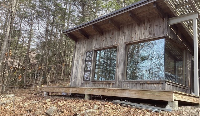 Enjoy fishing and kayaking from waterfront cabin retreat in charming Woodstock