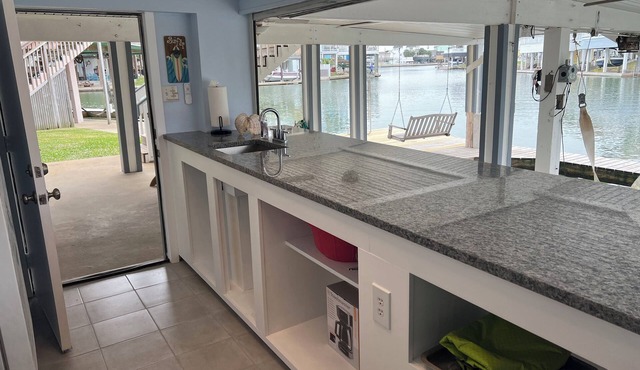 ENJOY FISHING, SWIMMING OR JUST RELAXING AT THIS JAMAICA BEACH CANAL PROPERTY