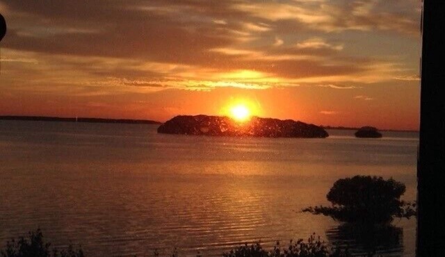 Enjoy gorgeous water views and incredible sunrises from this waterfront condo