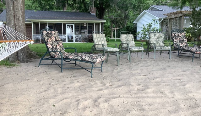 Enjoy Lake Waccamaw in a cozy cottage steps from the lake.