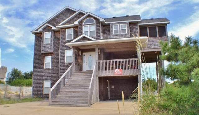 Enjoy ocean views from this beautiful home, nestled in a quiet soundside community.