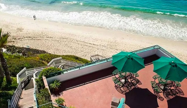 Enjoy oceanfront views in a corner suite in the Laguna Surf Resort.