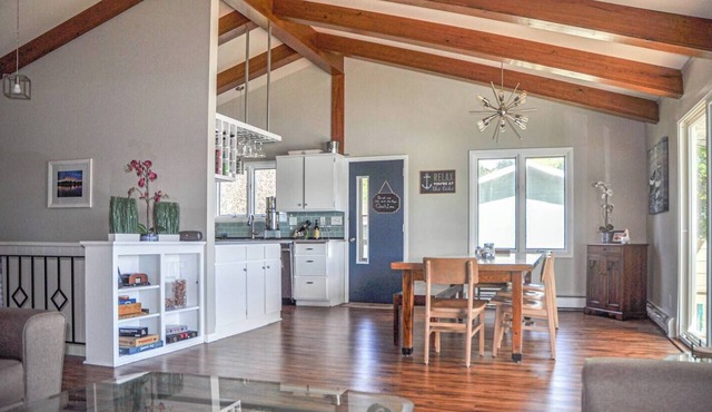 Enjoy our entire Mid-Century home located directly on the lake with private shoreline and beach. Take in stunning views of lake, woods and natural beauty of Minnesota, less than an hour from The Cities. Escape it all and find your place to relax.