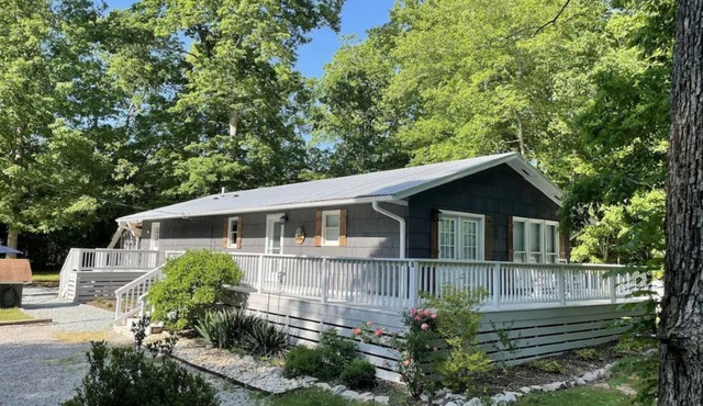 Enjoy peaceful lake life at the Cozy Lake Gaston Estates Cottage!