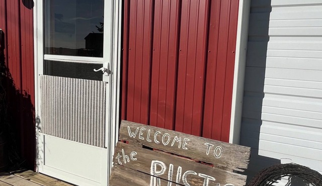 Enjoy peaceful prairie sunsets in rustic lodging in No Mans Land.