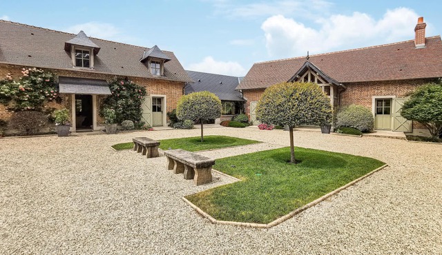 Enjoy privacy and luxury in this villa on a beautiful estate.