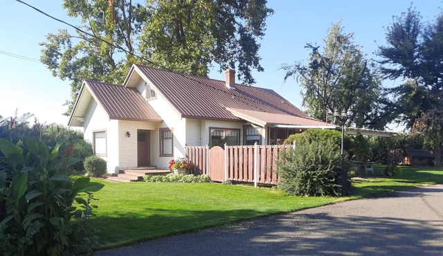 Enjoy rural country setting in this early 1900's farmhouse.