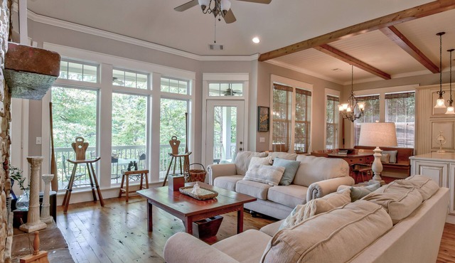 Enjoy spacious 4 bedroom home with stunning lake views and year round deep water