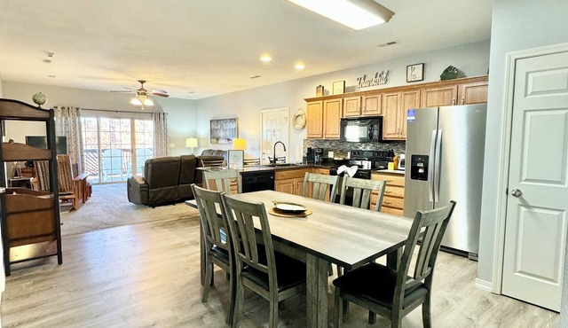 Enjoy sunsets and a dock for your boat from this walk-in condo.