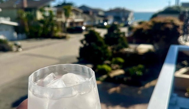 Enjoy the beach view at the Newly Remodeled 25th Beach Retreat with hot tub!