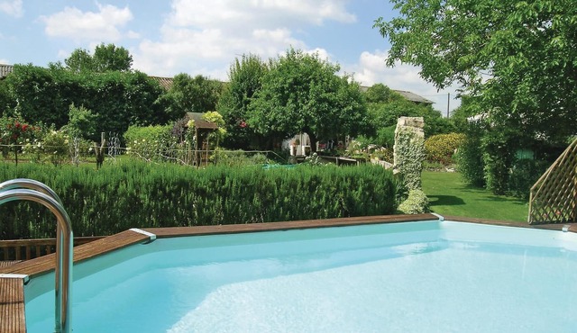 Enjoy the comfort in this beautiful vacation home with community pool.