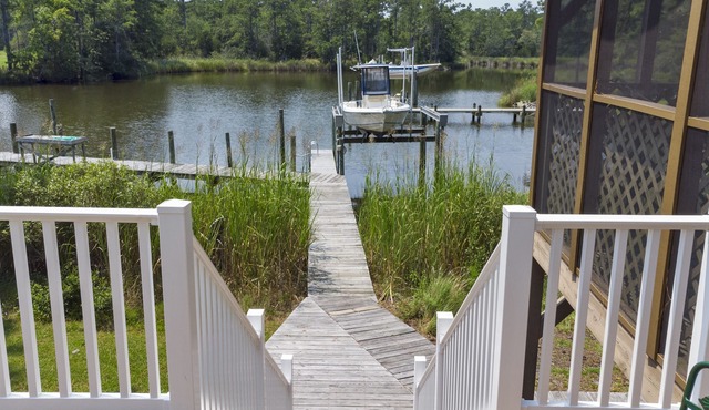 Enjoy the gorgeous creek views at the Tranquil Waters Cottage