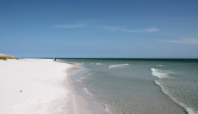 Enjoy the sunset above the fields.