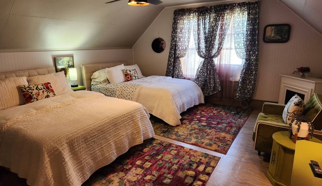 Enjoy the top floor of this victorian house nWith two suites & a bonus bedroom