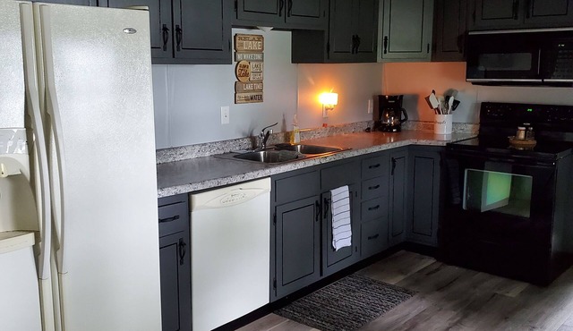 Enjoy this 2 bedroom, 1 bath, cozy lake side house located on Lake Onalaska.