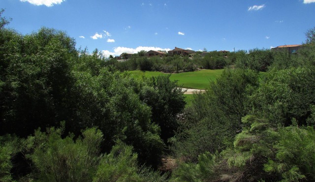 Enjoy this First Floor with Great Golf Course View and an extended patio